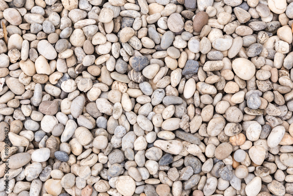Stone pebbles texture or stone pebbles background. stone pebbles for interior exterior decoration design business and industrial construction concept design. Stone pebbles motifs that occurs natural. Stone pebbles texture or stone pebbles background. stone pebbles for interior exterior decoration design business and industrial construction concept design. Stone pebbles motifs that occurs natural.