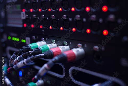 Sound system , Sound cable on  studio in plug.  wires plugged into sound amplifiers