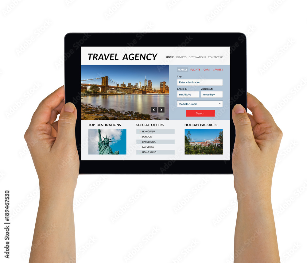 Hands holding digital tablet computer with travel agency concept on screen. Isolated on white. All screen content is designed by me Hands holding digital tablet computer with travel agency concept on screen. Isolated on white. All screen content is designed by me