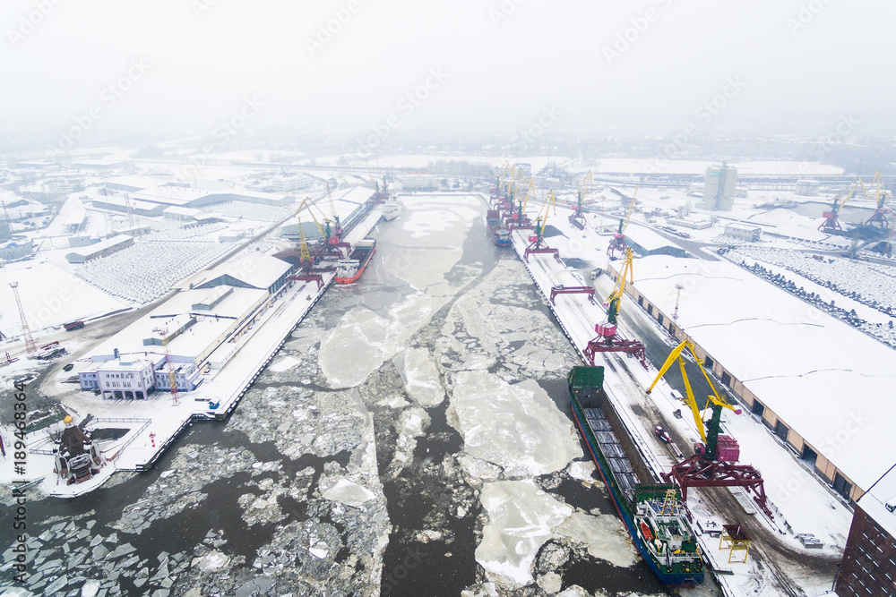 Fototapeta premium Aerial: The port of Kaliningrad in the cold winter
