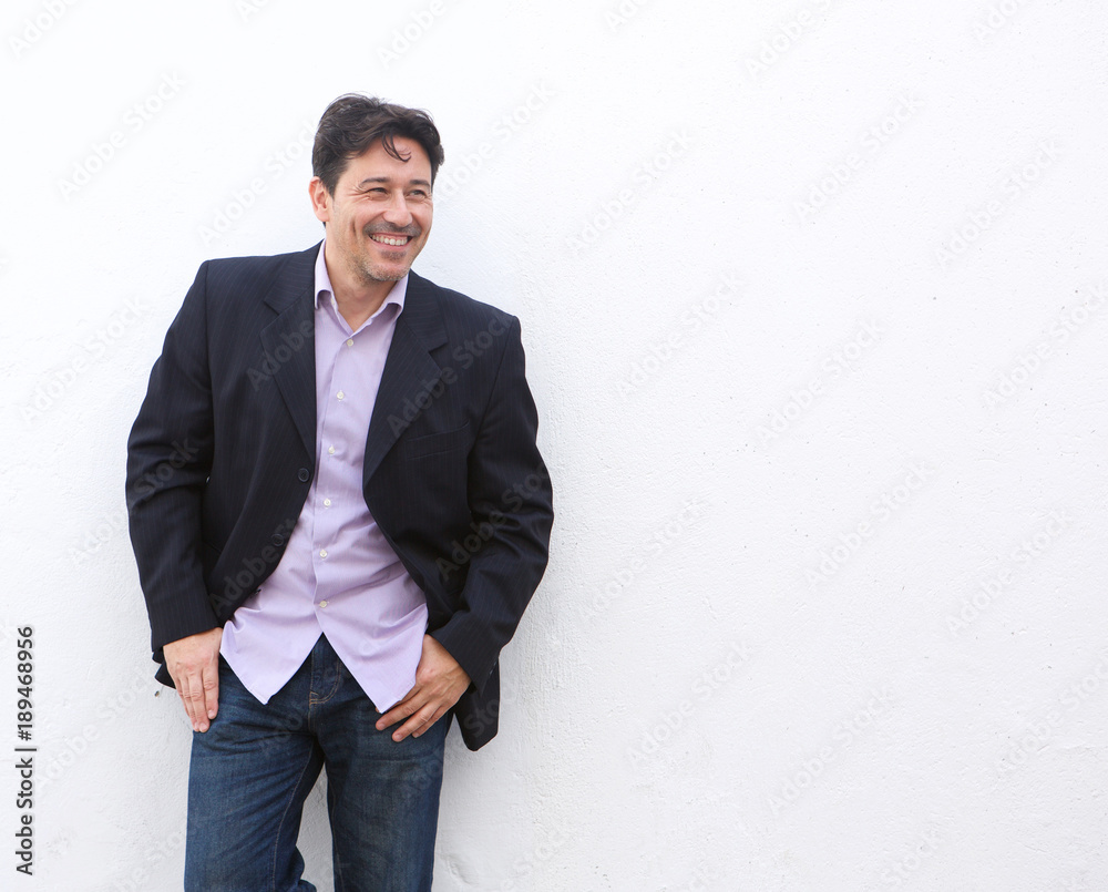 stylish mature businessman standing against white background stylish mature businessman standing against white background