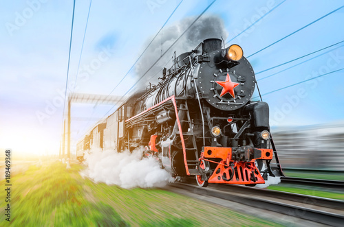 Obraz na plátně Vintage black steam locomotive train rush railway