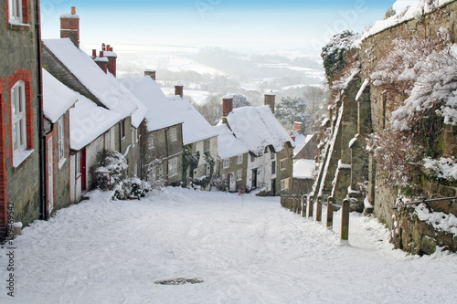 gold hill in the snow shaftesbury  photo