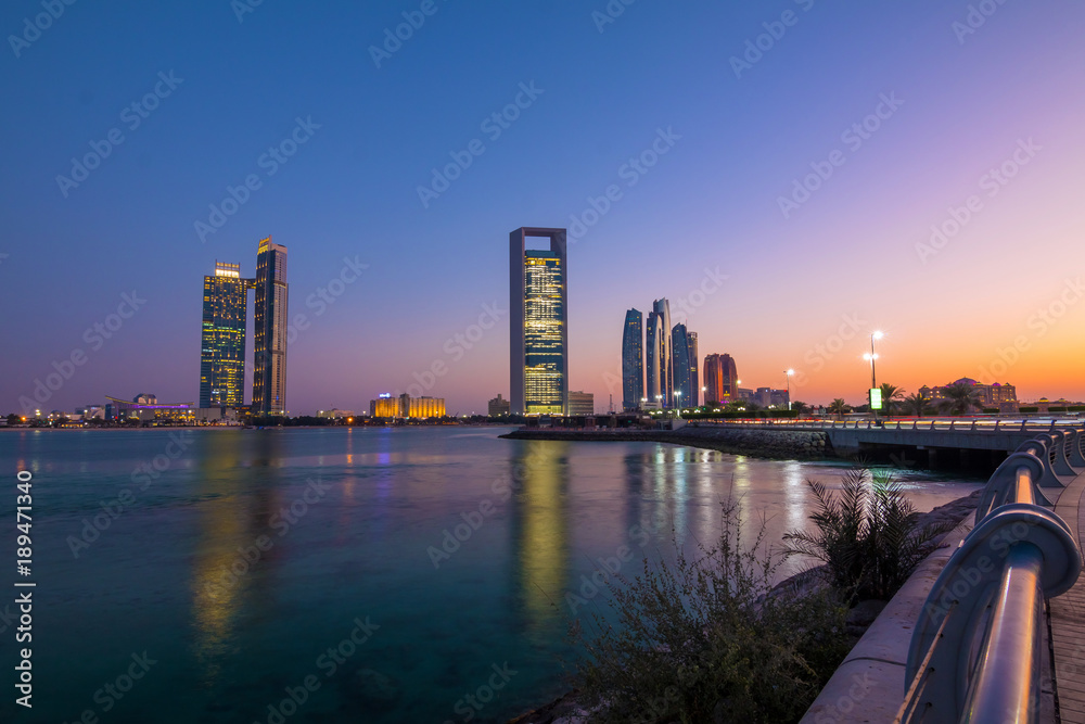 View of Abu Dhabi Skyline at sunset, United Arab Emirates