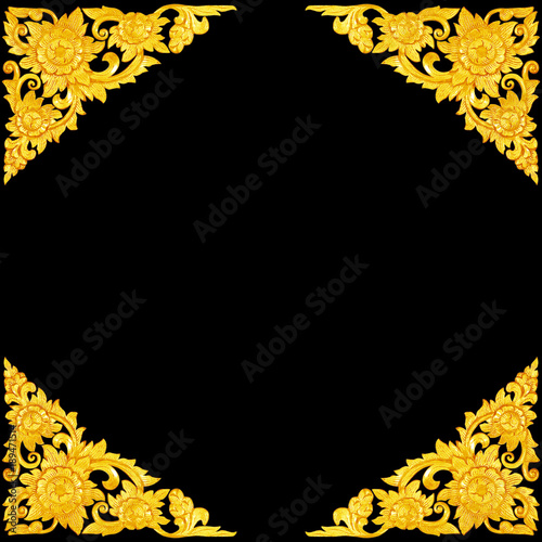 Pattern of wood carve gold paint for decoration on black  background