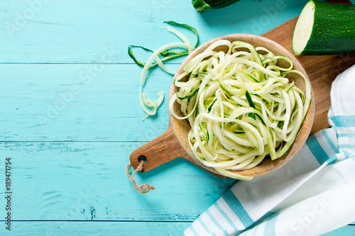 Raw zucchini noodles in a bowl