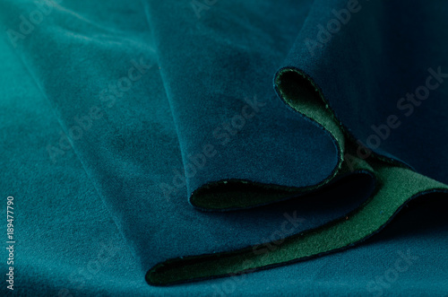 Bright color of seawave velour textile sample. Fabric texture background photo