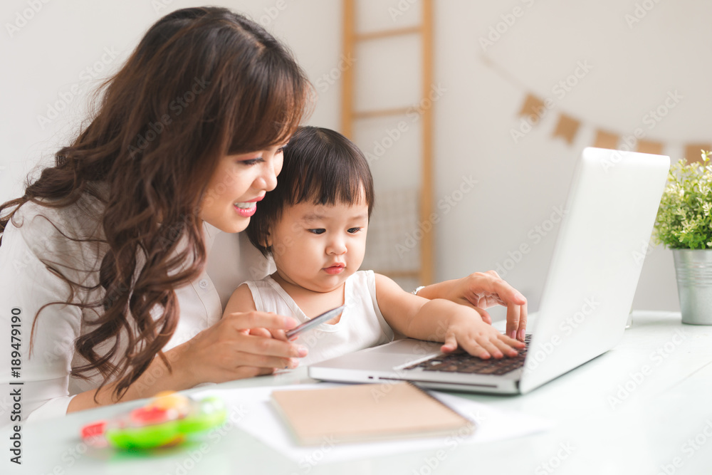 Mother and daughter are learning to write. Mother and daughter are learning to write.