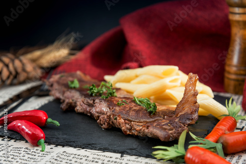 juicy steak veal beef meat with tomato and potatoes