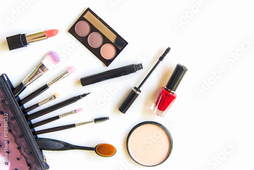 Makeup cosmetics tools background and beauty cosmetics, products and facial cosmetics package lipstick, eyeshadow on the white background.  Lifestyle Concept..