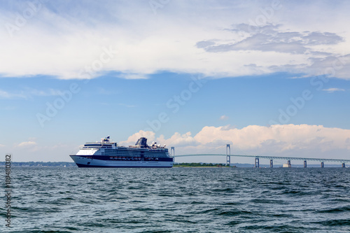 Blue and White Cruise Ship by Bridge in Newport © dbvirago