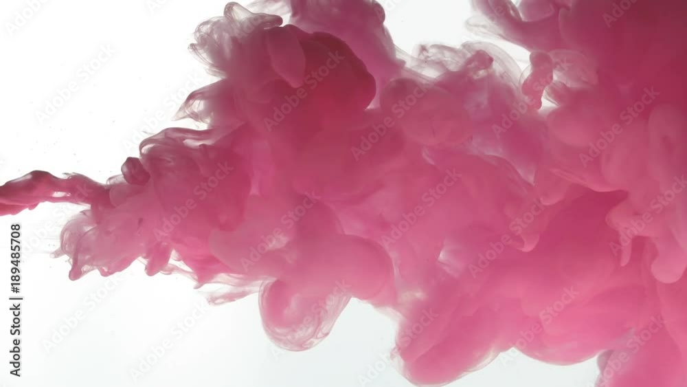 Color Ink flowing in water on white background
