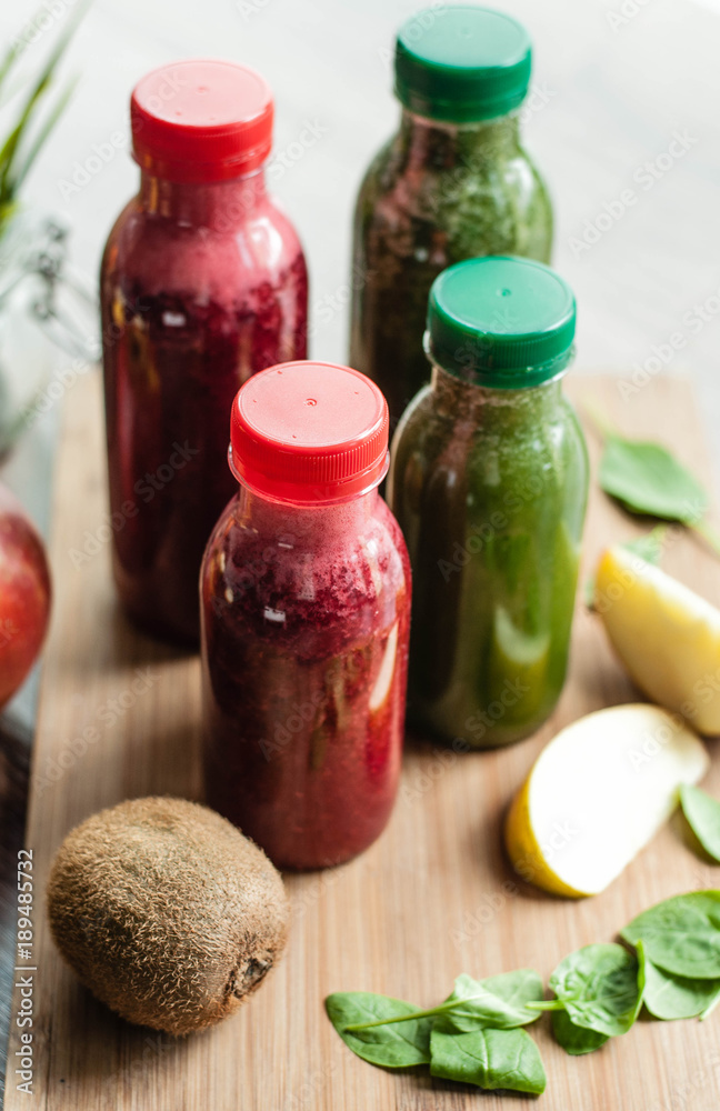 colorful fruit smoothie in bottles colorful fruit smoothie in bottles