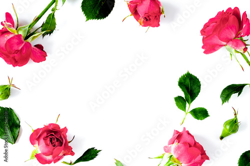 berry color decorative cosmetics with roses white background top