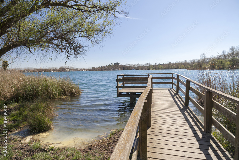 Landscape lake with wooden lookout in Banyoles,Catalonia,Spain.