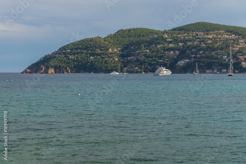 Panoramic view on the yachts in the harbour of the Theoule sur Mer located on the waterfront seen from Mandelieu-la-Napoule, France, Europe