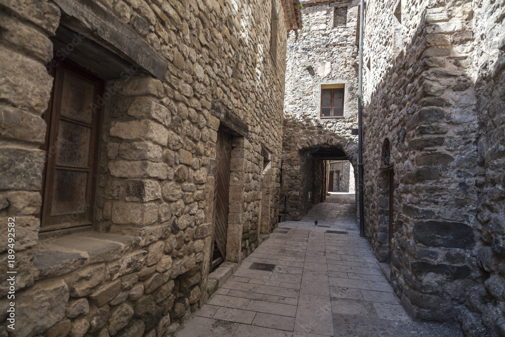 Ancient street in medieval village of Besalu,Catalonia,Spain. Ancient street in medieval village of Besalu,Catalonia,Spain.