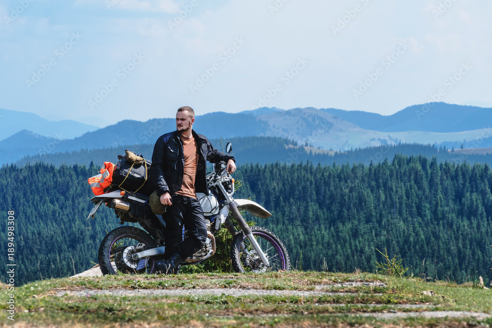 Motorbikes on the road in mountains with Charpatian in background, havy touring bike travel concept