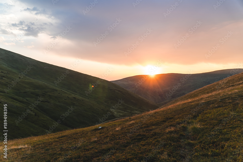 Mountain landscapes of Ukraine. Bright calm sunset over the Chaprpatian mountains