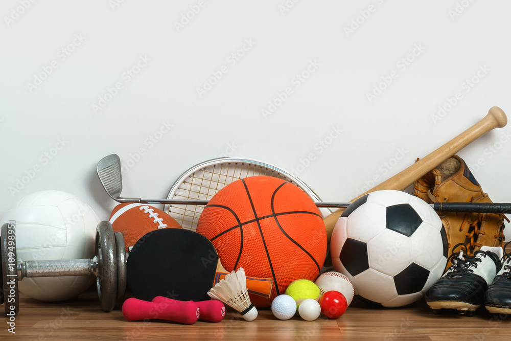 Sports Equipment on wooden background