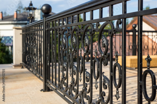 Decorative, forged banisters, fence in old style