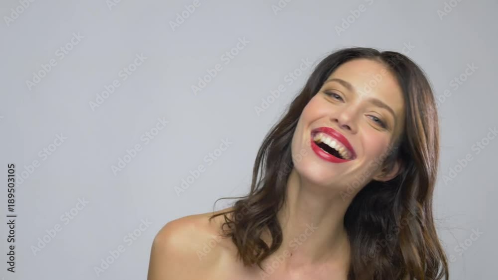 beautiful laughing young woman with red lipstick beautiful laughing young woman with red lipstick