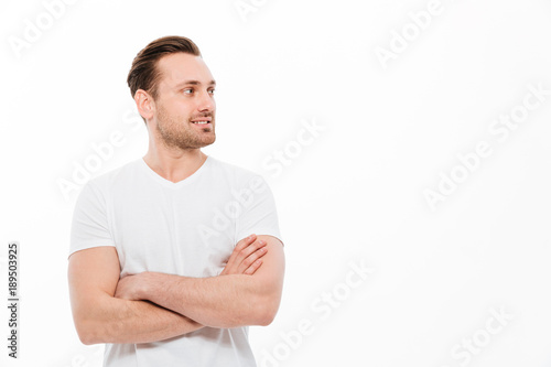 Handsome young man standing isolated