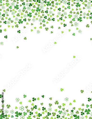 Clover shamrock leaves isolated on white background. Abstract St. Patrick's day border background with place for your text. Vector flat illustration for your greeting cards design or poster