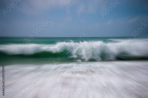 Motion image of waves breaking on the shoreline