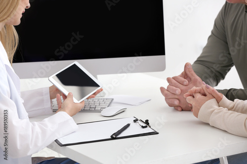 Female doctor consulting ma...