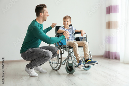 Young man taking care of li...