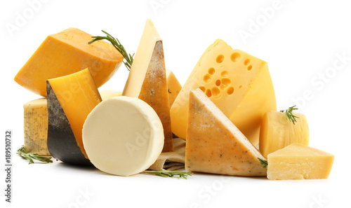 Different types of delicious cheese on white background