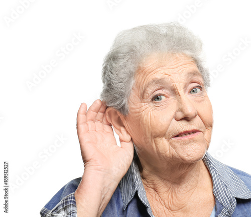 Elderly woman with hearing ...