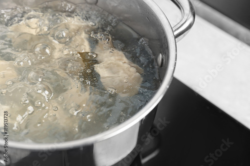 Cooking dumplings in boiling water, closeup