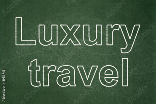 Tourism concept: text Luxury Travel on Green chalkboard background