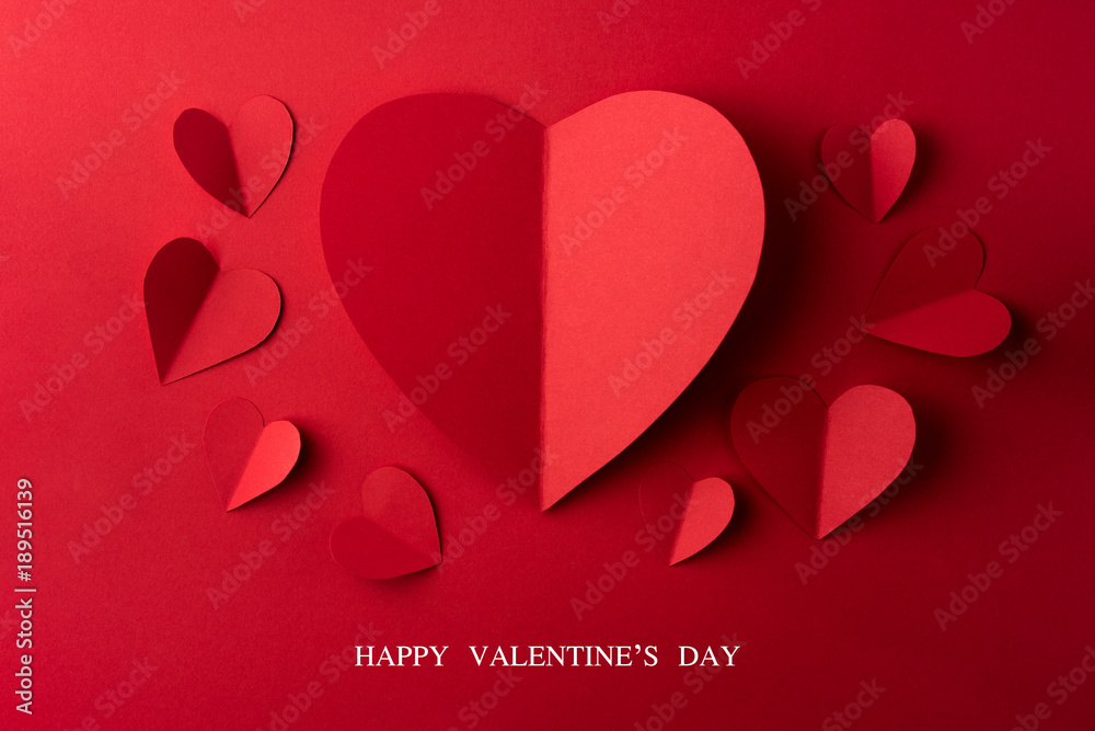 Red paper hearts on red background, Valentines day card. Stock Photo ...
