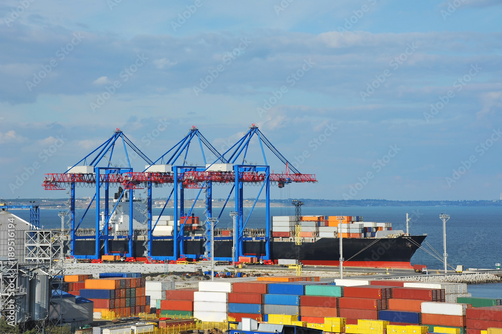 Fototapeta premium Port cargo crane, ship and container