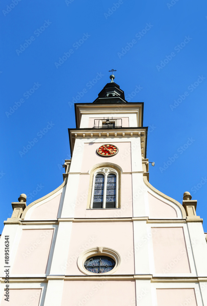 WIELICZKA, POLAND - MARCH 27, 2017: Church clock tower