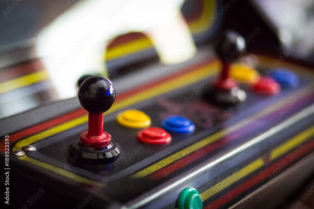 Joystick of a vintage arcade videogame - Coin-Op Stock Photo | Adobe Stock