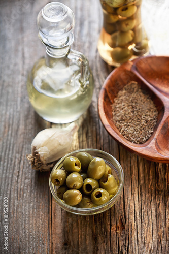 fresh green olives and olive oil