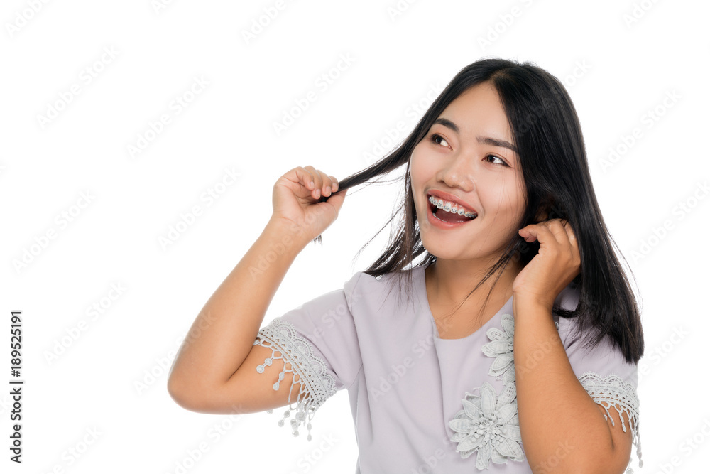 Portrait of a beautiful asian woman smiling. Isolated on white background Portrait of a beautiful asian woman smiling. Isolated on white background