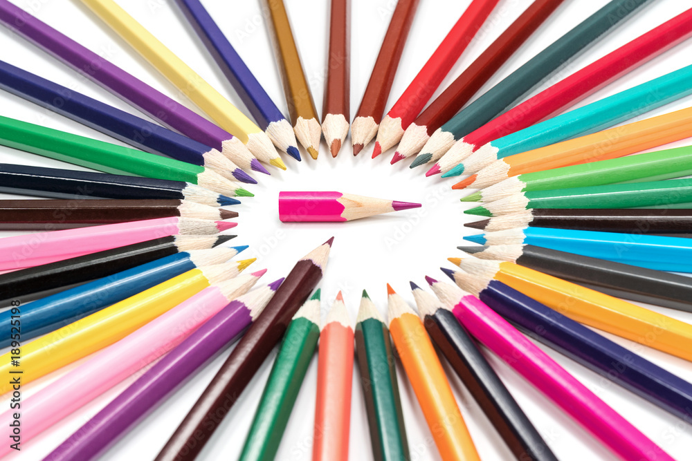 Brown pencil indicates a short pink pencil in the middle of a circle of pencils isolated on a white background