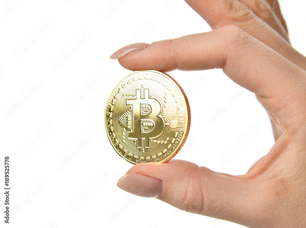 Hand hold gold bitcoin cryptocurrency isolated on white background Hand hold gold bitcoin cryptocurrency isolated on white background