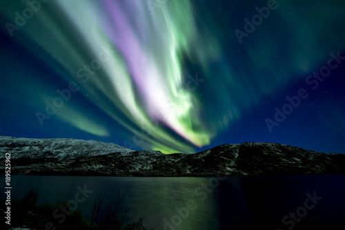 The polar lights in Norway . Ersfjord. Tromso