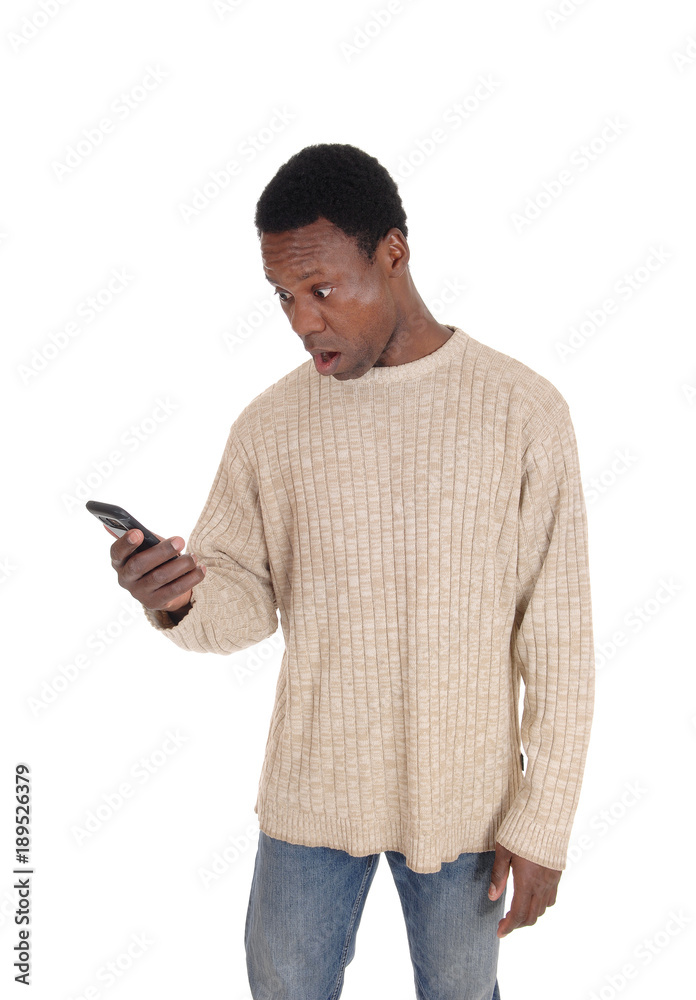 Man looking scary at his phone