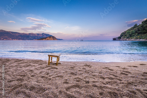 Evening view from small Mogren Beach with Island of Saint Nicholas in Budva  Montenegro