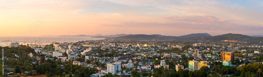 DUONG DONG, PHU QUOC, VIETNAM - NOVEMBER 21, 2017: Beautiful panoramic view from the high on town, sea, bay and hills at sunset