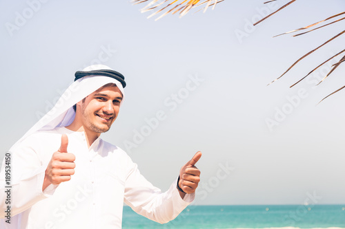 Young Arabian Man On The Beach