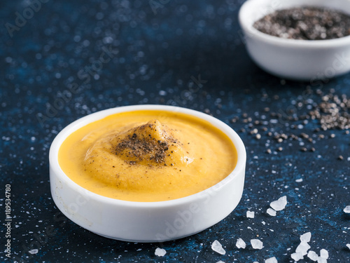 Vegan creamy cheddar cheese sauce with chia seeds