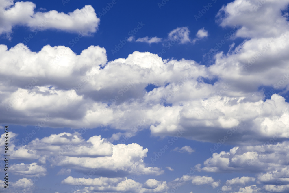 Blue sky with white and gray clouds. Blue sky with white and gray clouds.